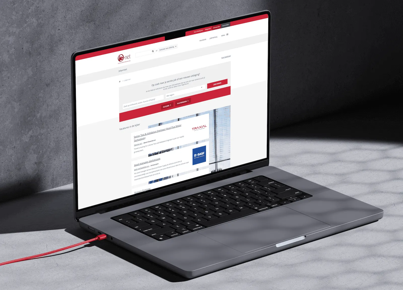 The redesigned ie-net vacancy page open on a laptop